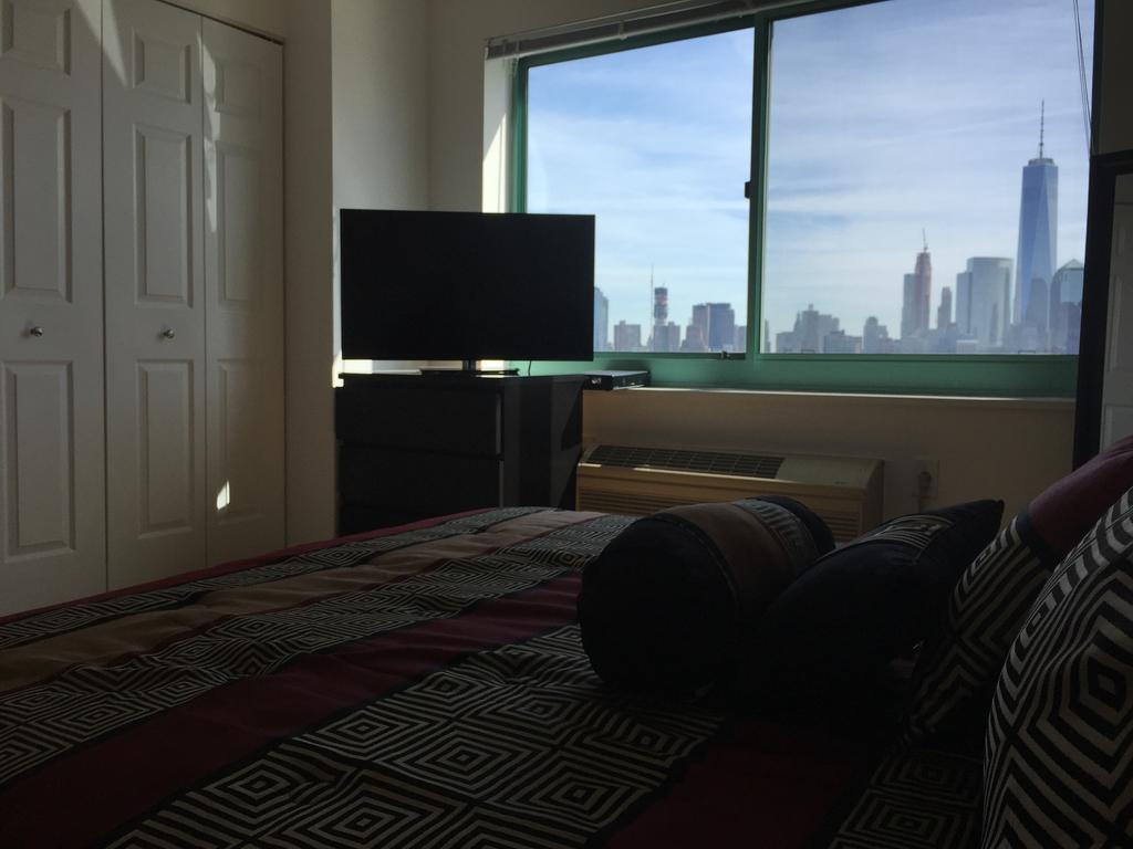 Cesar Suites At River Court Jersey City Room photo